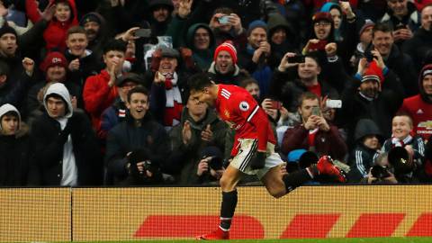 Soccer Football - Premier League - Manchester United vs Huddersfield Town - Old Trafford, Manchester, Britain - February 3, 2018   Manchester United’s Alexis Sanchez celebrates scoring their second goal    Action Images via Reuters/Lee Smith    EDITORIAL USE ONLY. No use with unauthorized audio, video, data, fixture lists, club/league logos or "live" services. Online in-match use limited to 75 images, no video emulation. No use in betting, games or single club/league/player publications.  Please contact your account representative for further details.